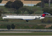 DELTACONNECTION_CRJ900_N548CA_LAX_0213_JP_small.jpg