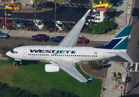 WESTJET_737-700_C-GRWS_LAX_1113J_JP_small~0.jpg