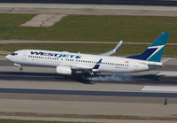 WESTJET_737-800_C-FKWJ_LAX_0213M_JP_small.jpg